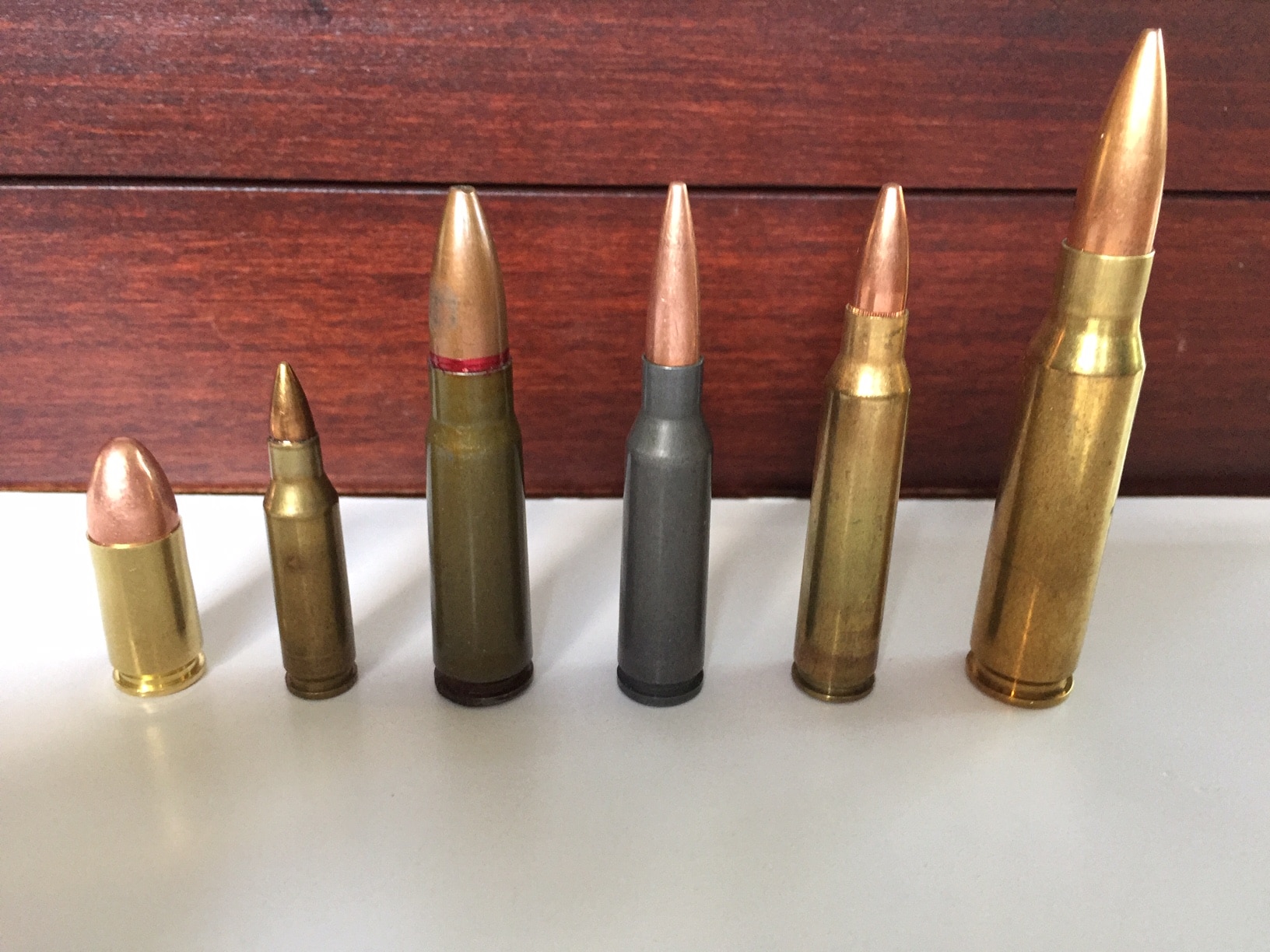 Figure 2 Sample cartridges left to right: 9x19mm, 4.6x30mm, 7.62x39mm, 5.45x39mm, 5.56x45mm, 7.62x51mm. Photograph by author.